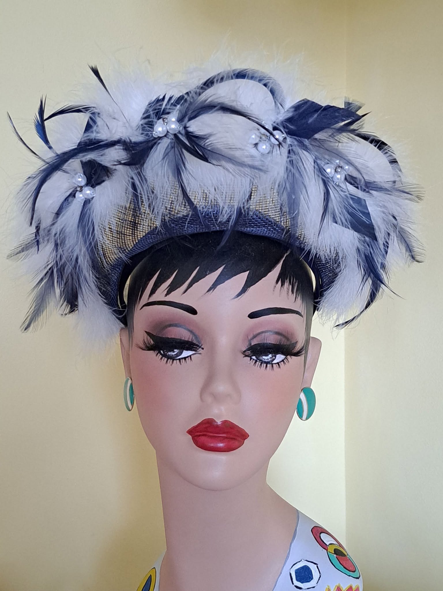 Periwinkle feathered fascinator with pearls