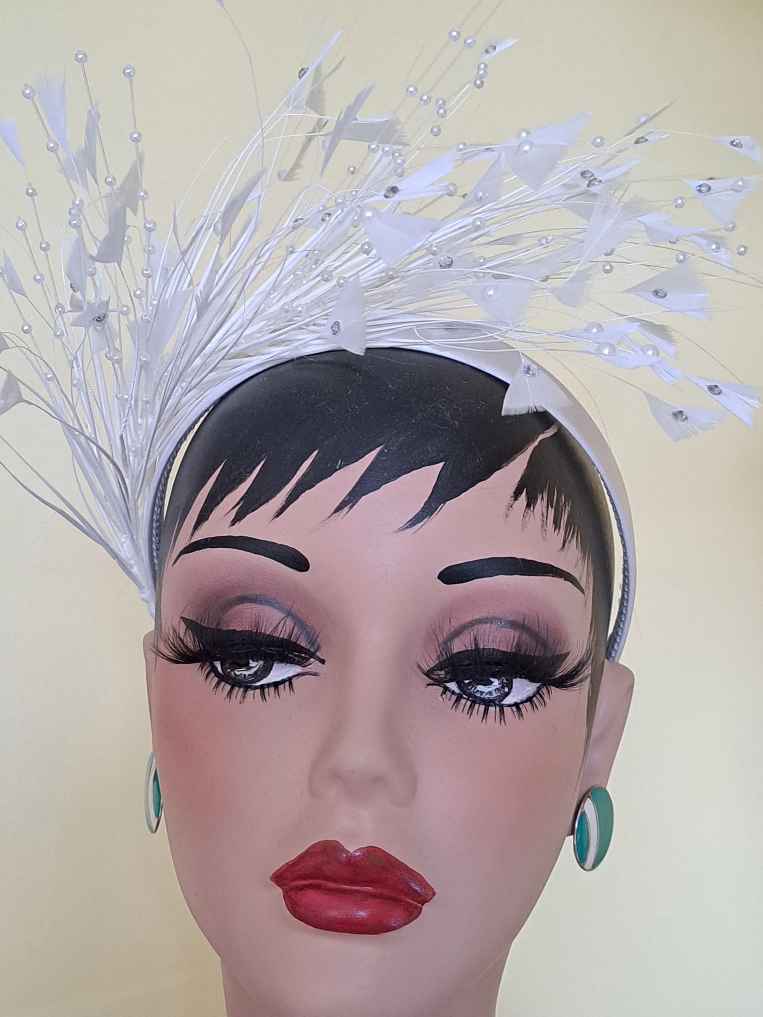 Ornate feathered fascinator headpiece