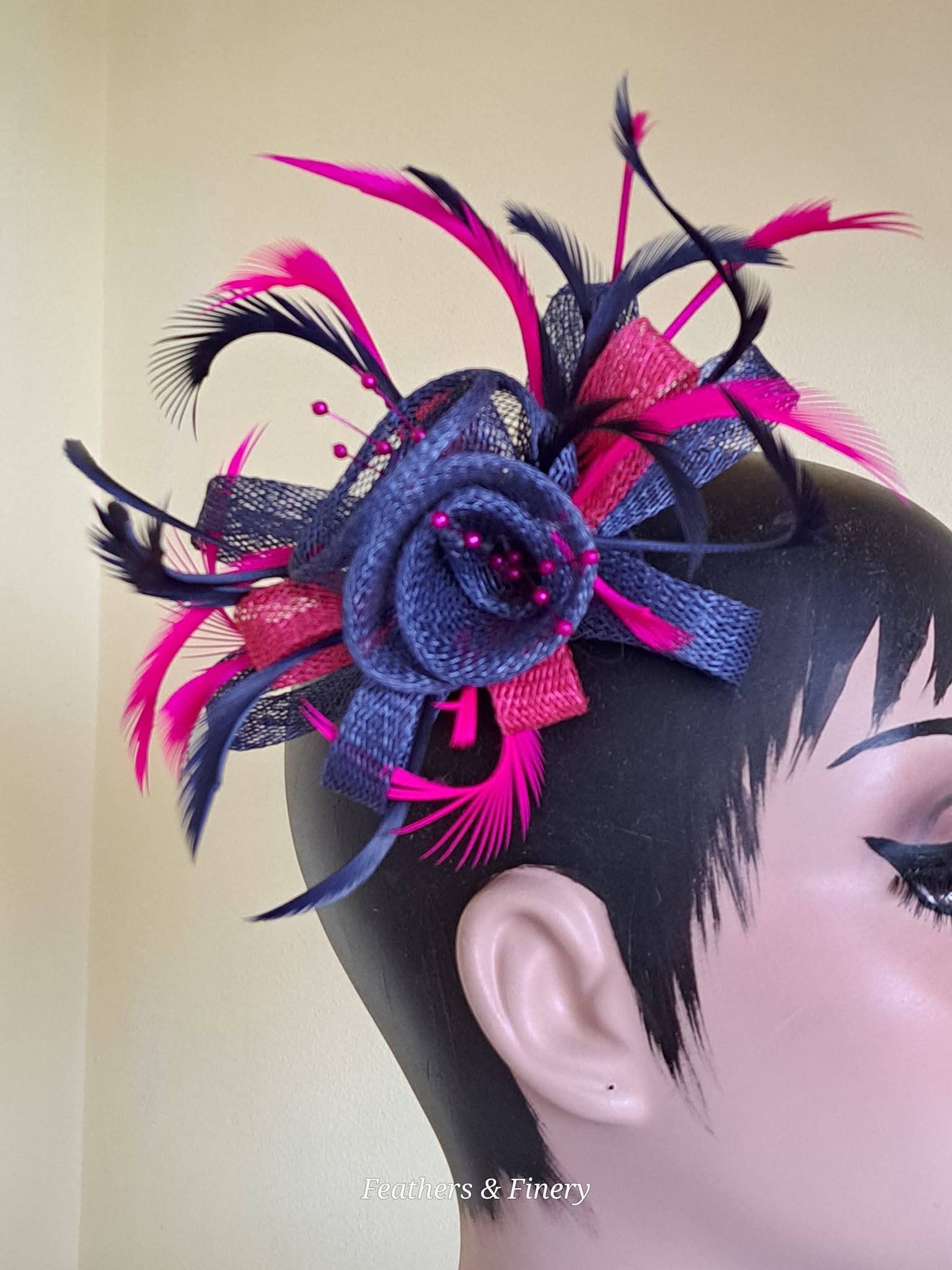 Navy and magenta feathered fascinator hat