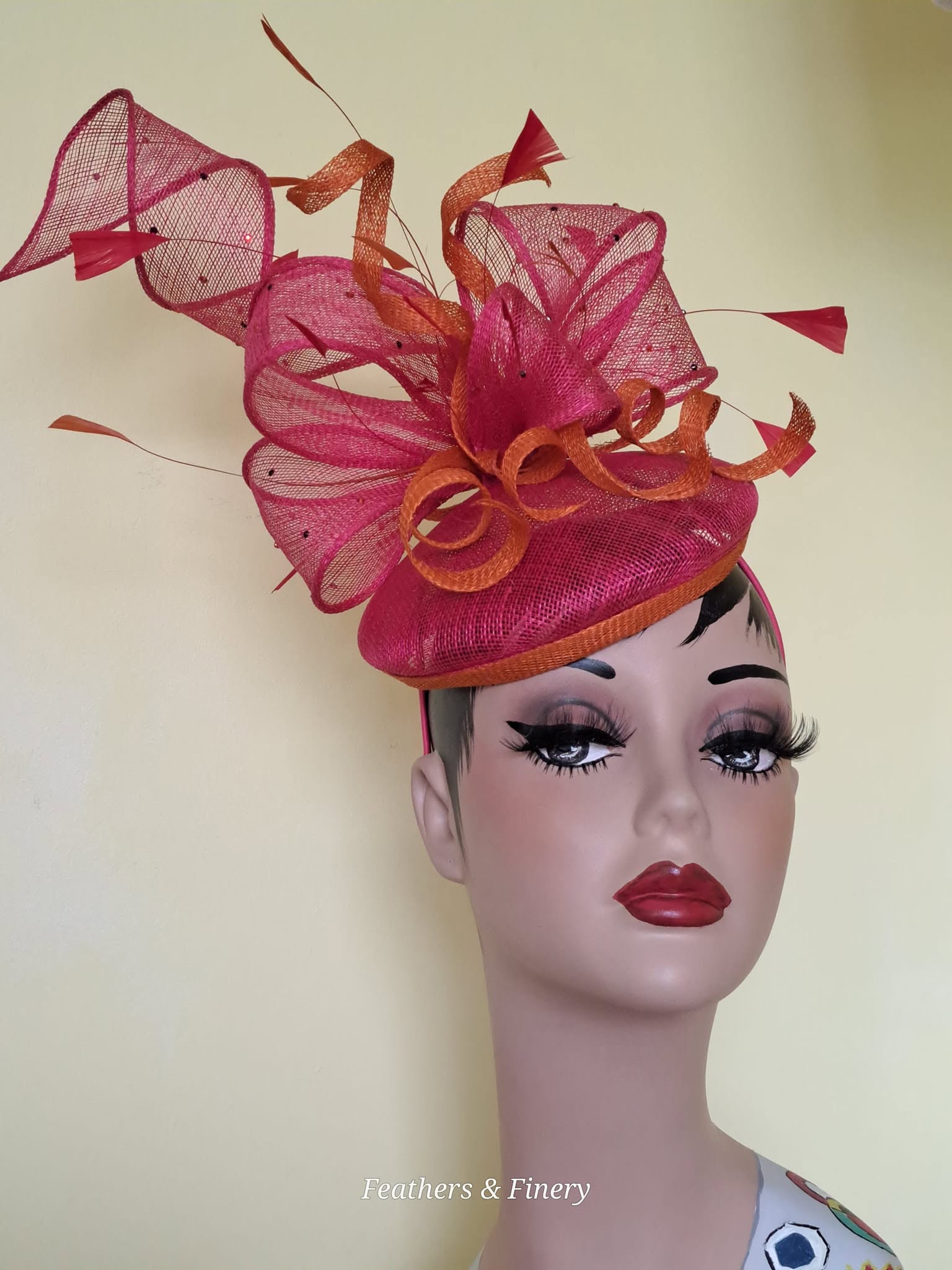 Pink and orange feathered fascinator hat